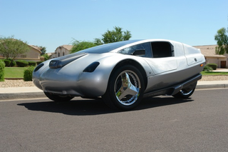 Illustration for article titled 125 MPG Diesel-Electric Three-Wheeled Car Headed For Production